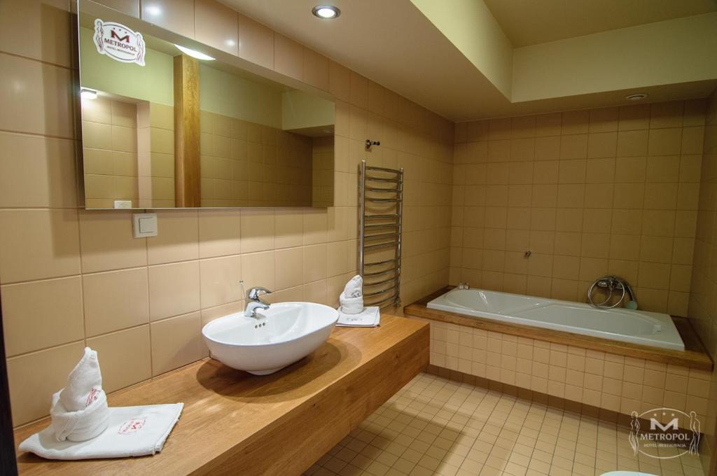 Metropol Hotel Śrem Szoba fotó